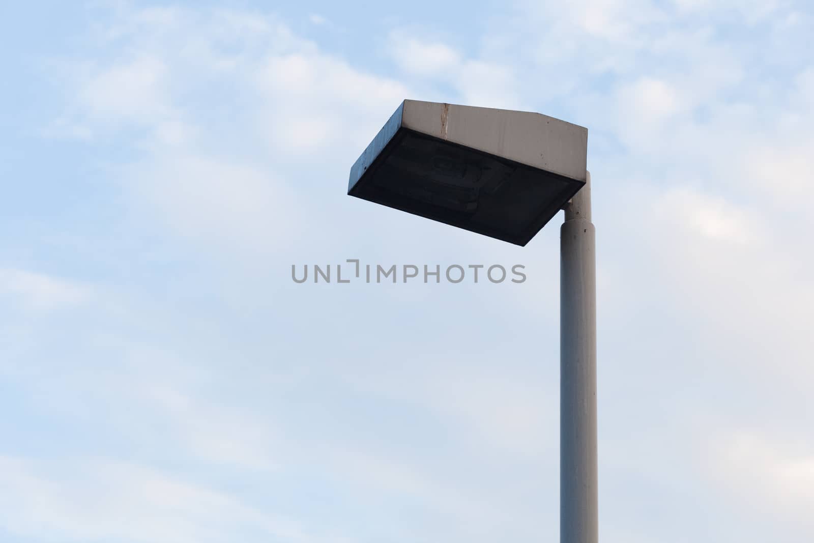 Recessed lighting in public. In the background is the sky in the evening.