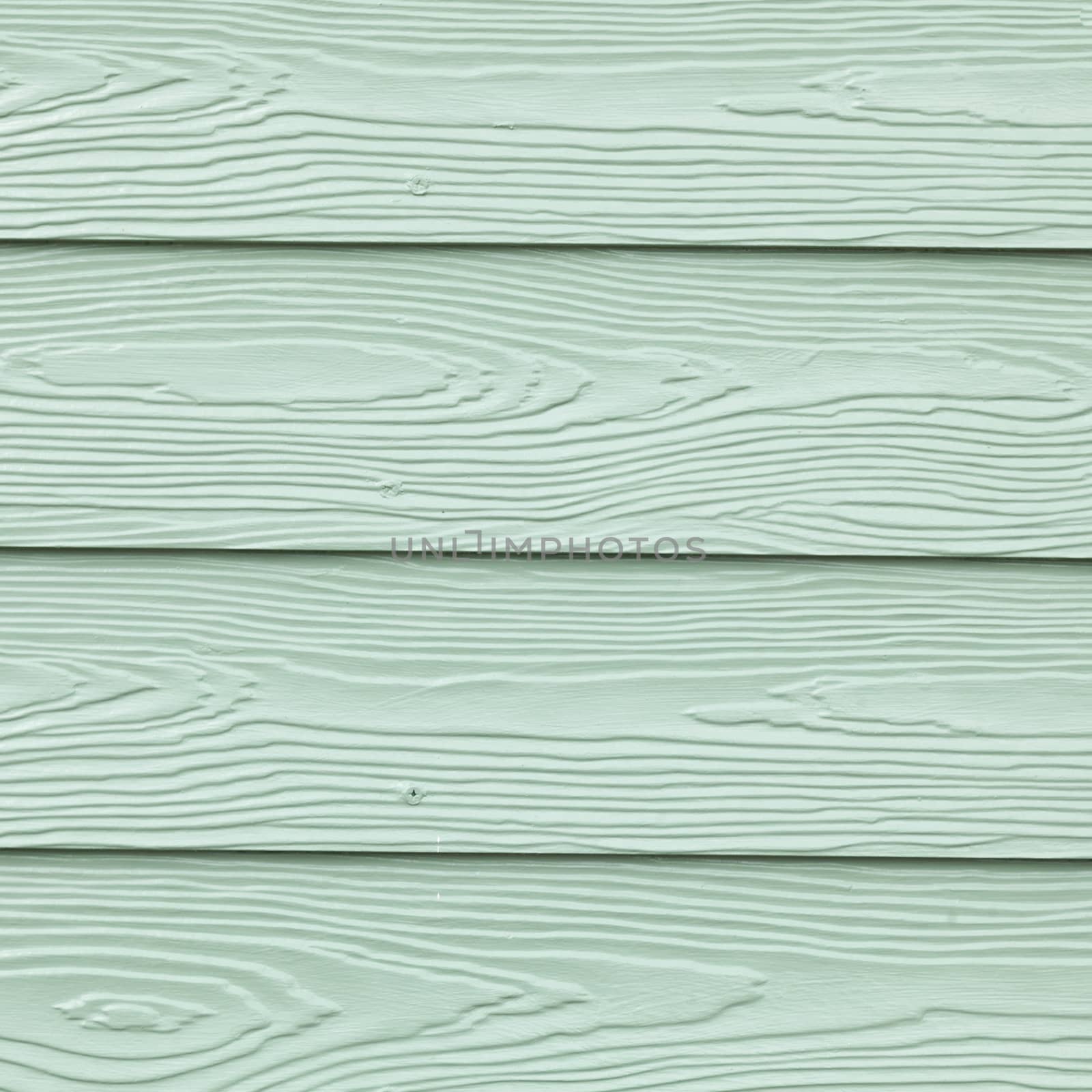 Wall is wood. Green wall of floor, wall trim.