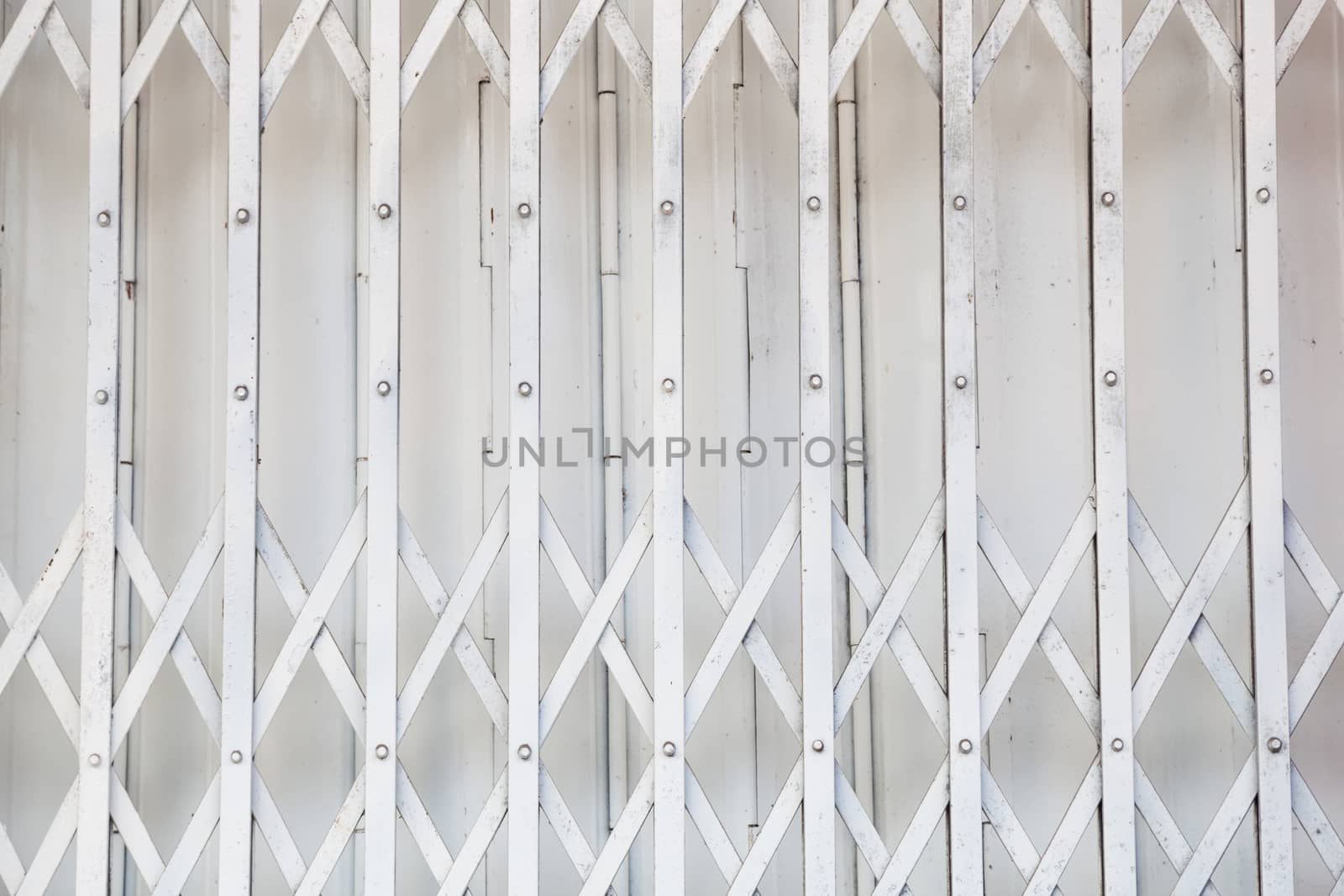 White iron gate. A piece of white iron gate of the house.