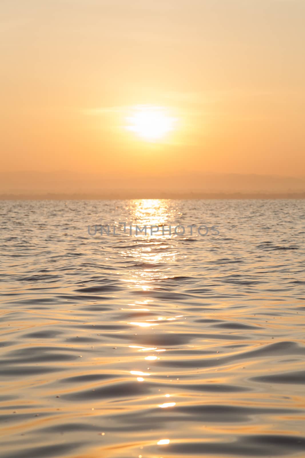 Sunrise in the morning. In front of a water storage dams. And clear skies in the morning.