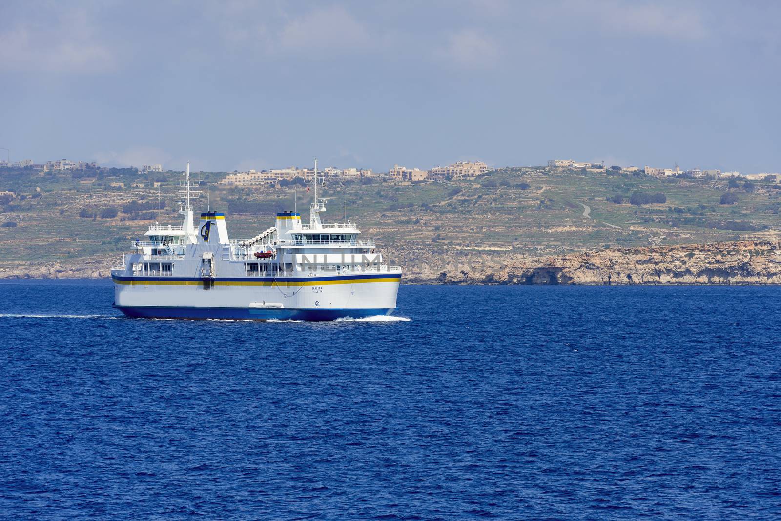 Malta ferry boat with Gozo island on background