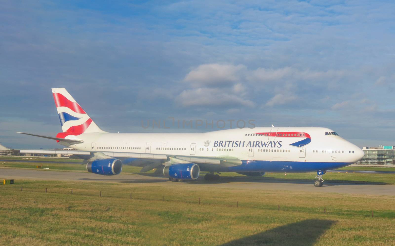 LONDON HEATHROW, UK - CIRCA DECEMBER 2014: Boeing 747 Jumbo aircraft of the British Airways on the runway ready for take-off