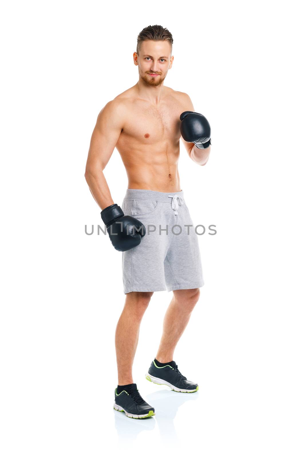 Sport attractive man wearing boxing gloves on the white by vlad_star