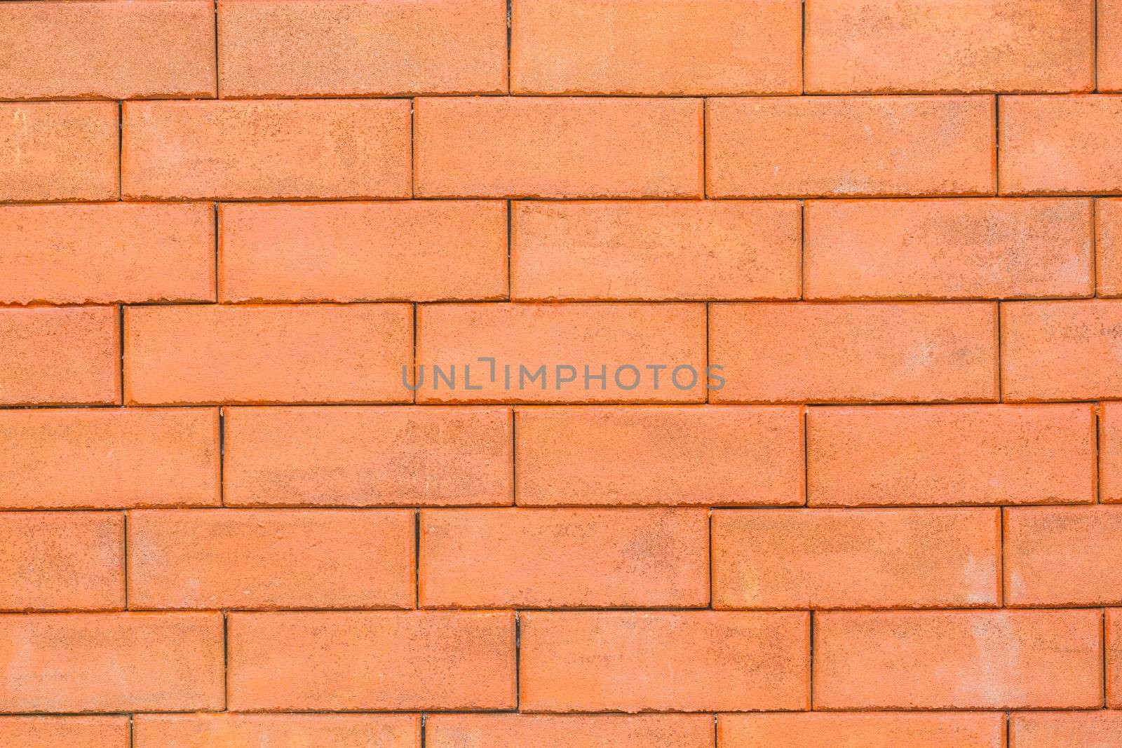 close-up red clean brick wall used for background.