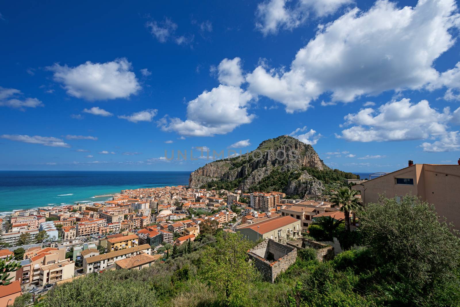 Bay in Cefalu Sicily clouds by Nanisimova