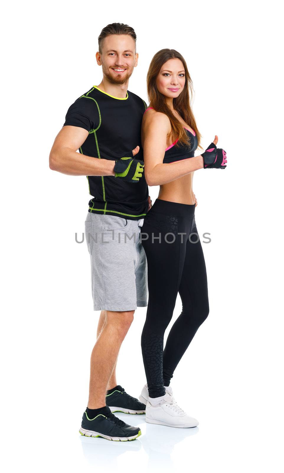 Sport man and woman after fitness exercise with a finger up on the white background