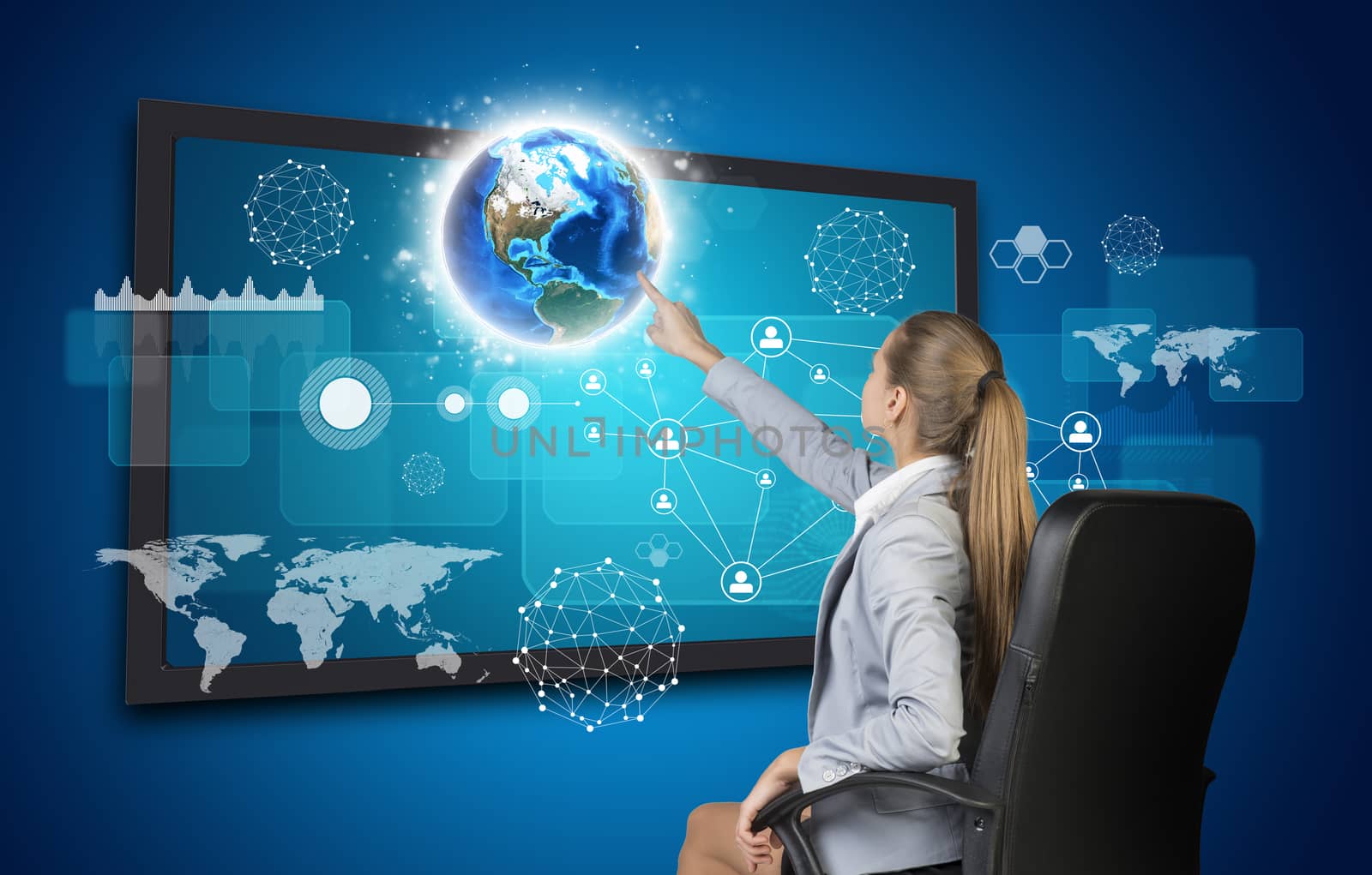 Businesswoman pressing touch screen button on virtual interface with Globe and other elements, on blue background. Element of this image furnished by NASA