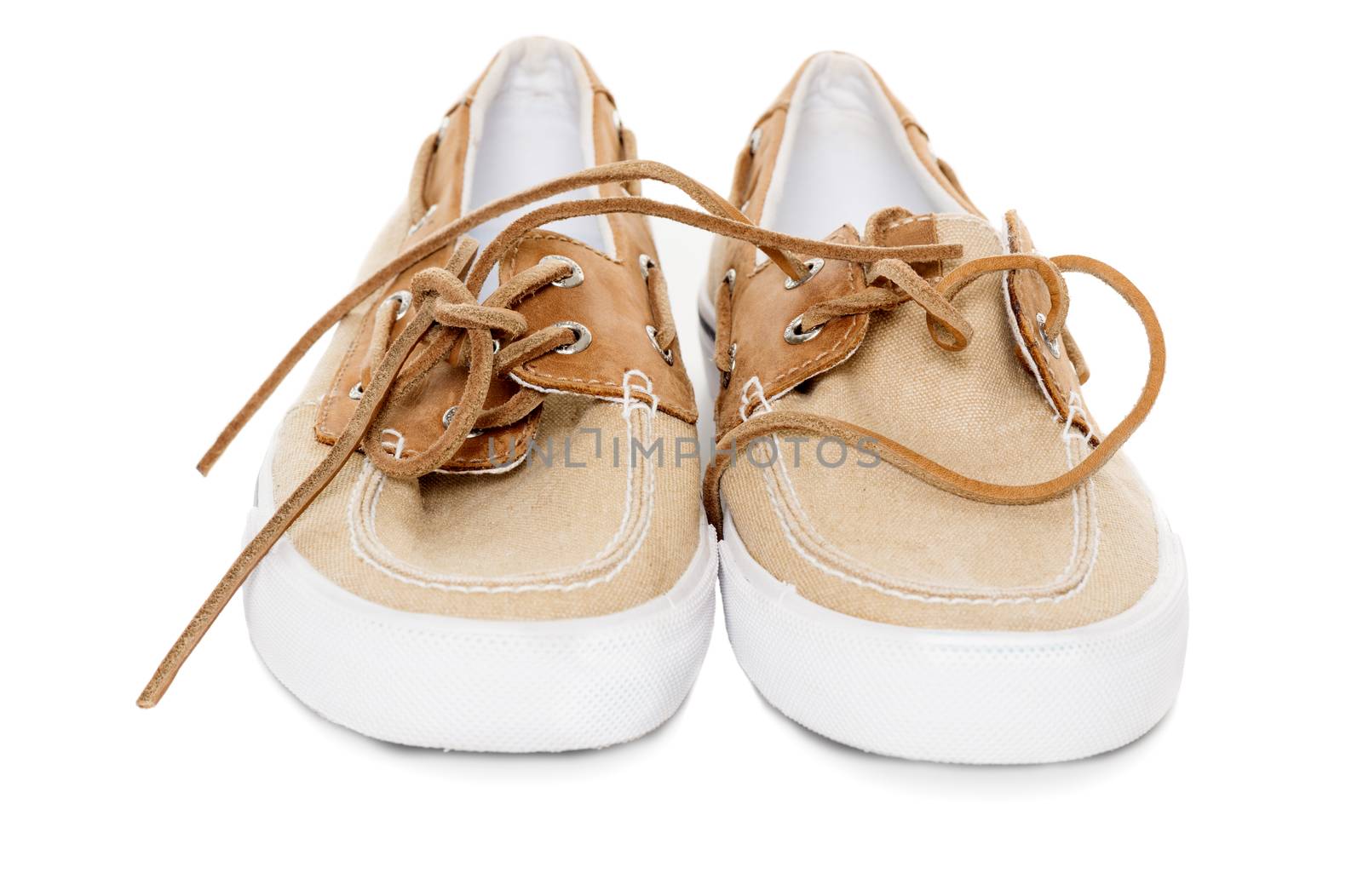 Pair of boat shoes isolated on white front view by Nanisimova