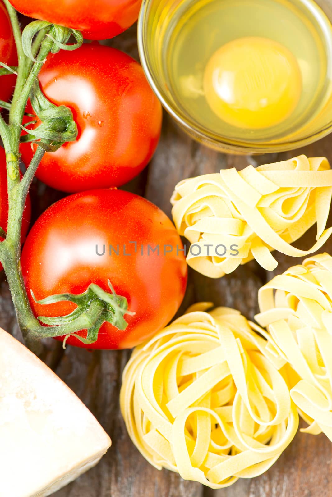 Ingredients for cooking pasta top view by Nanisimova