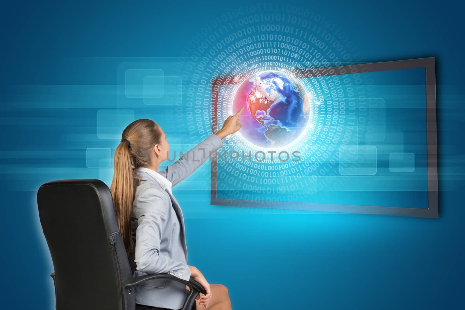 Businesswoman using touch screen interface with Globe and radiant figures, on blue background. Element of this image furnished by NASA