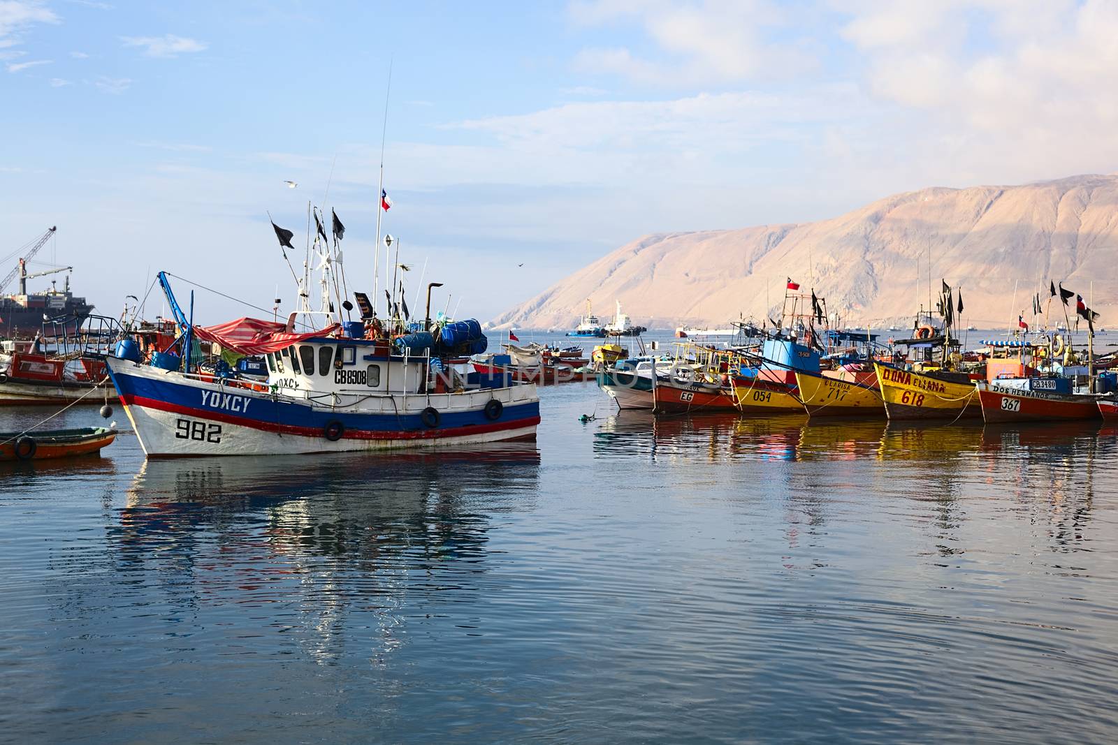 IQUIQUE, CHILE - JANUARY 22, 2015: Fishing boats anchoring in the port of Iquique on January 22, 2015 in Iquique, Chile. Iquique is an important port city in Northern Chile. 