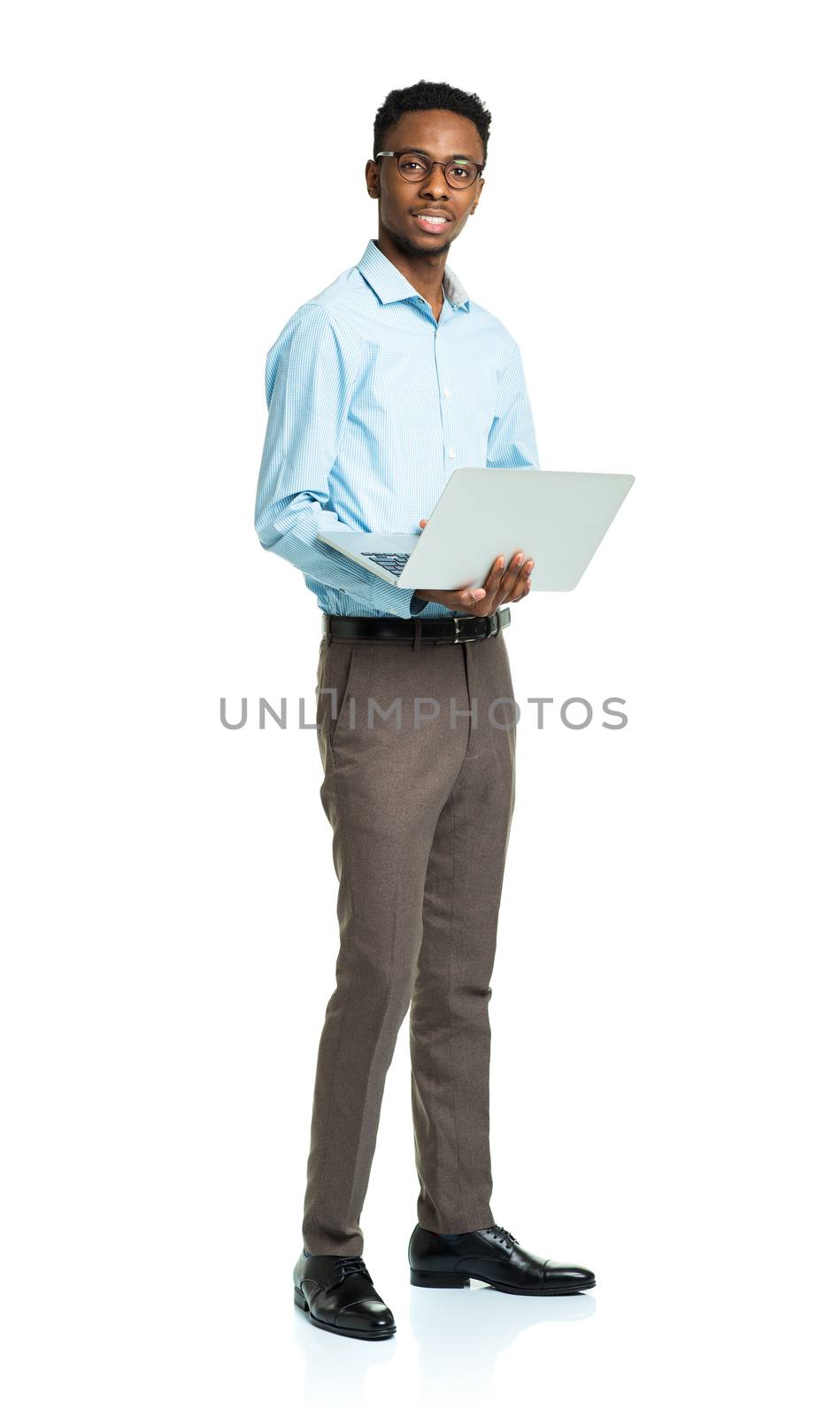 Happy african american college student standing with laptop on white background