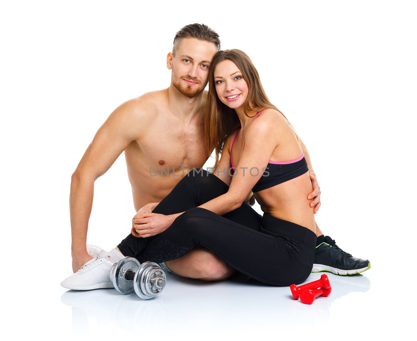 Sport couple - man and woman after fitness exercise sitting with by vlad_star