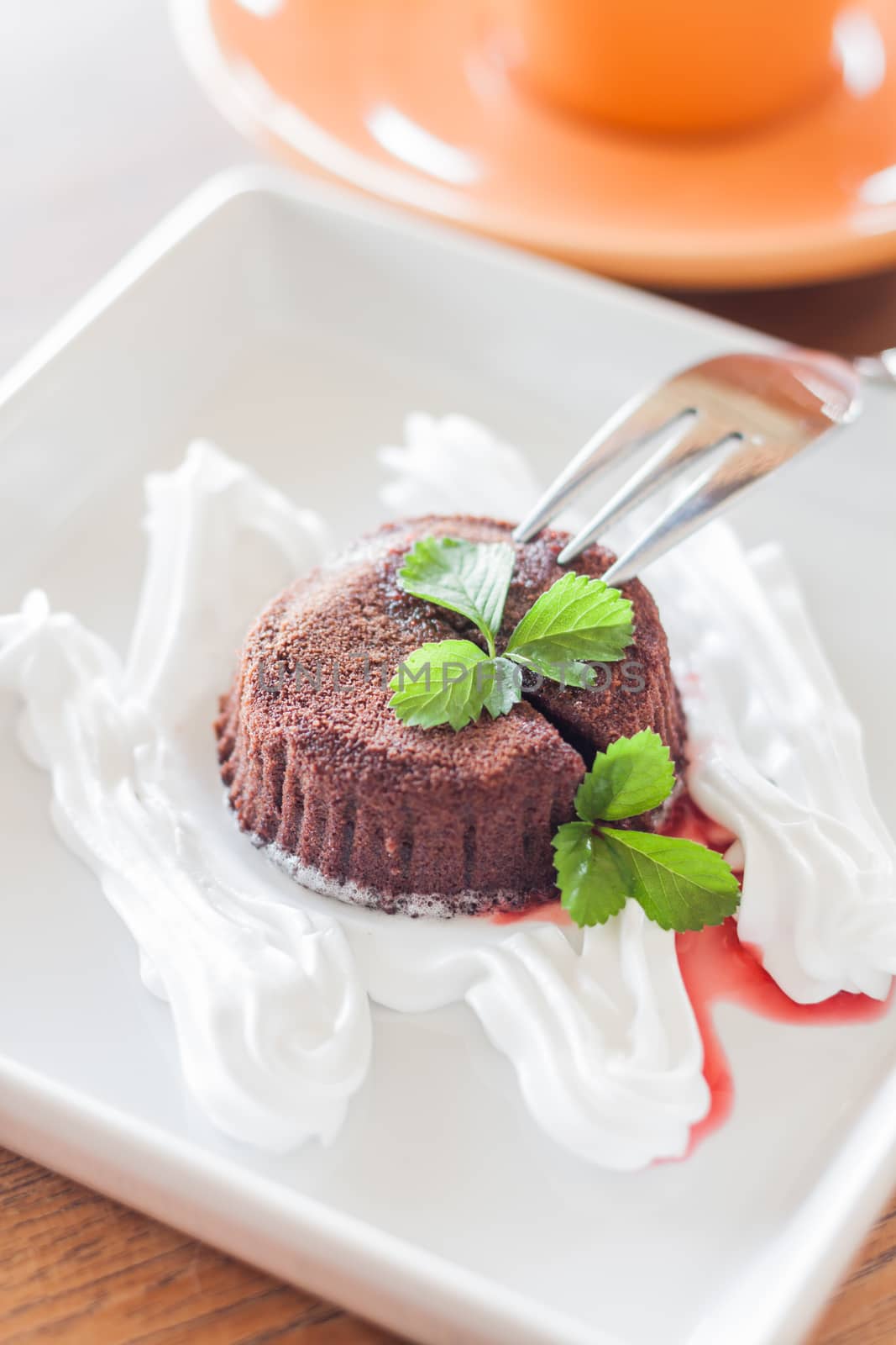 Chocolate lava cake with fork, stock photo