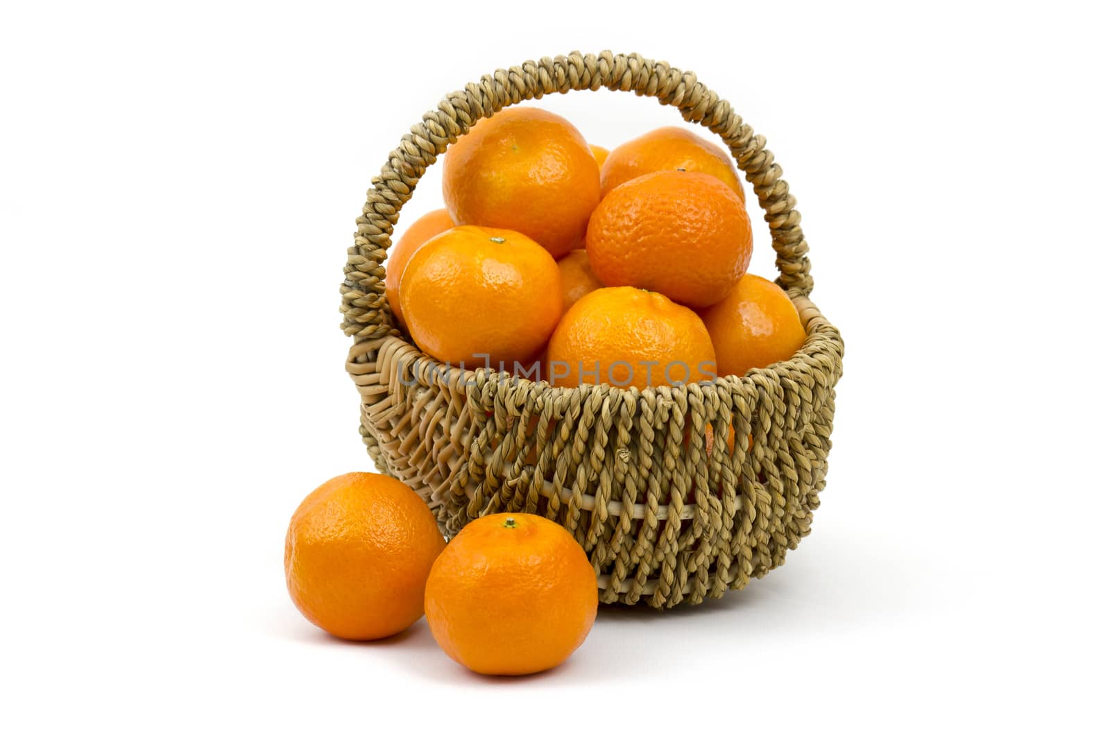 tangerines in a basket on white background 