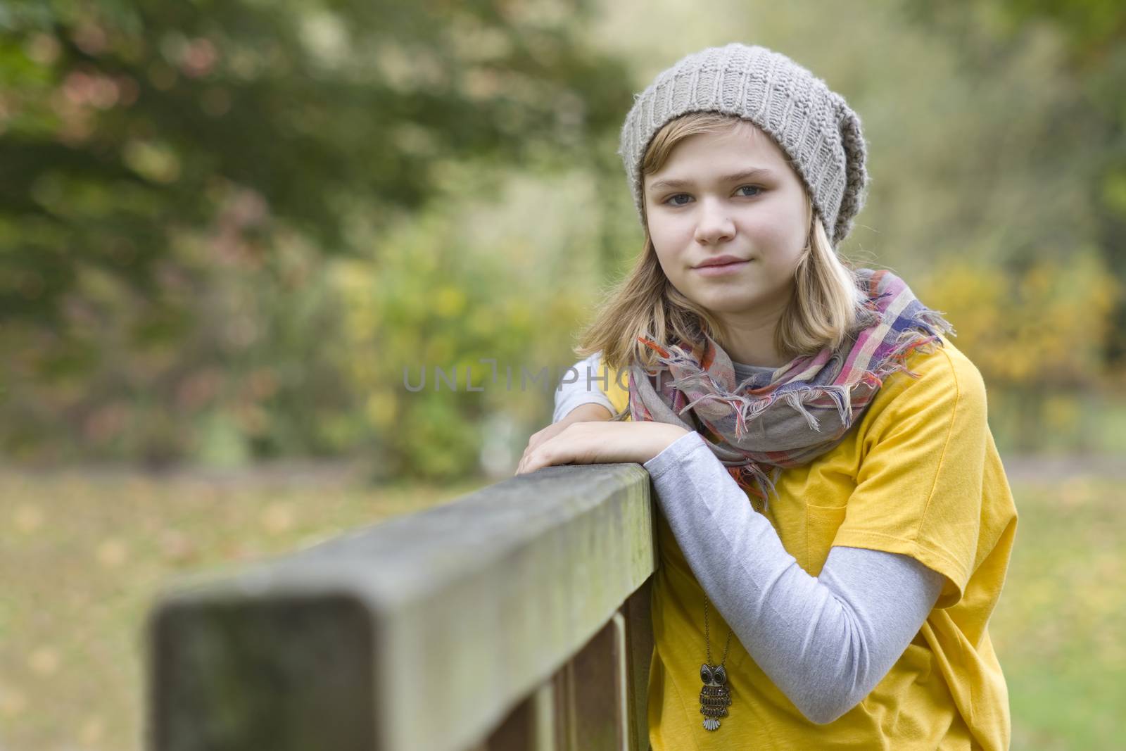 young girl in the autumn park - portrait