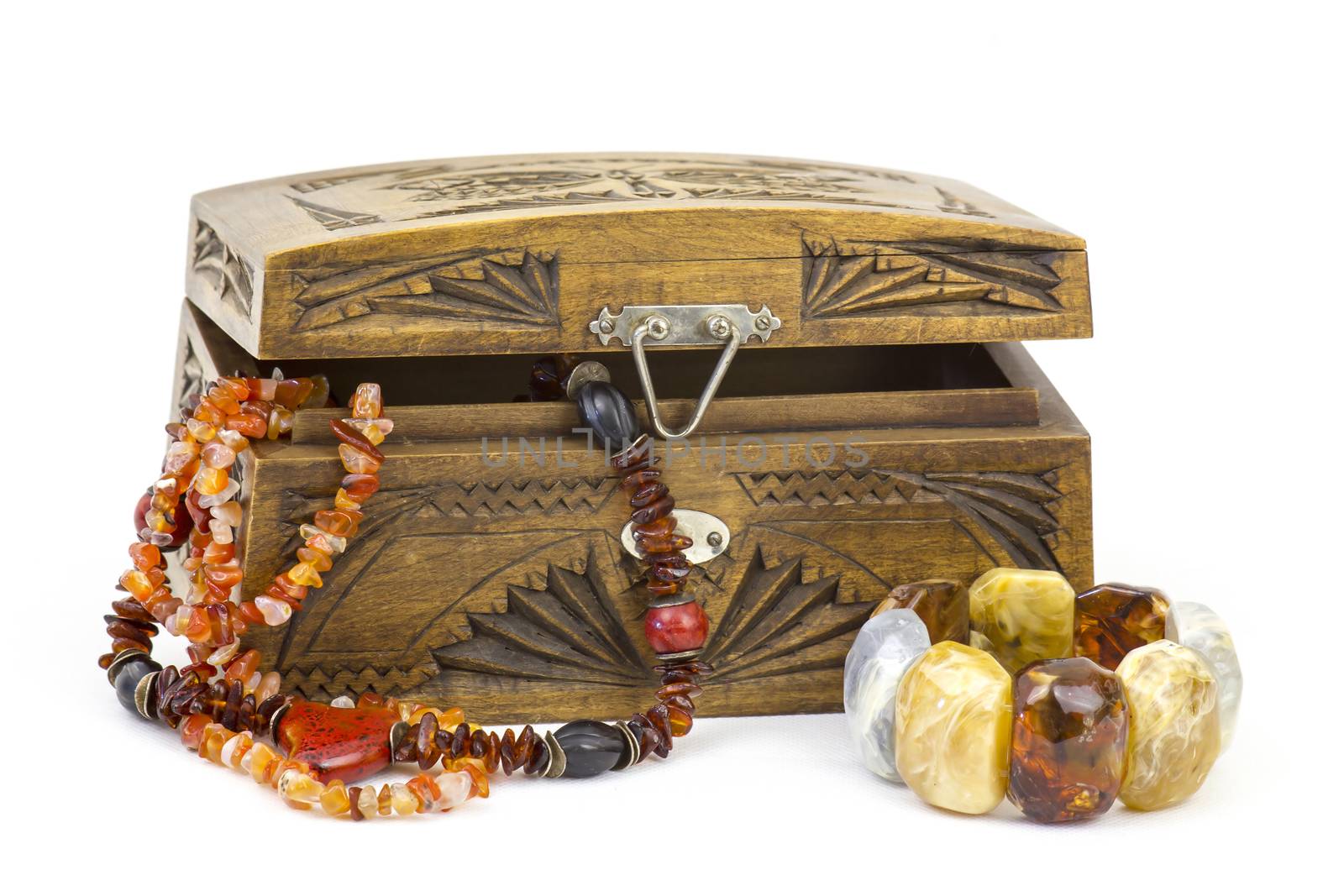 wooden casket with jewellery by miradrozdowski