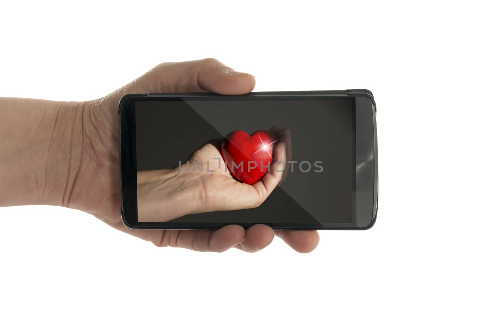 red heart on mobile phone  by compuinfoto