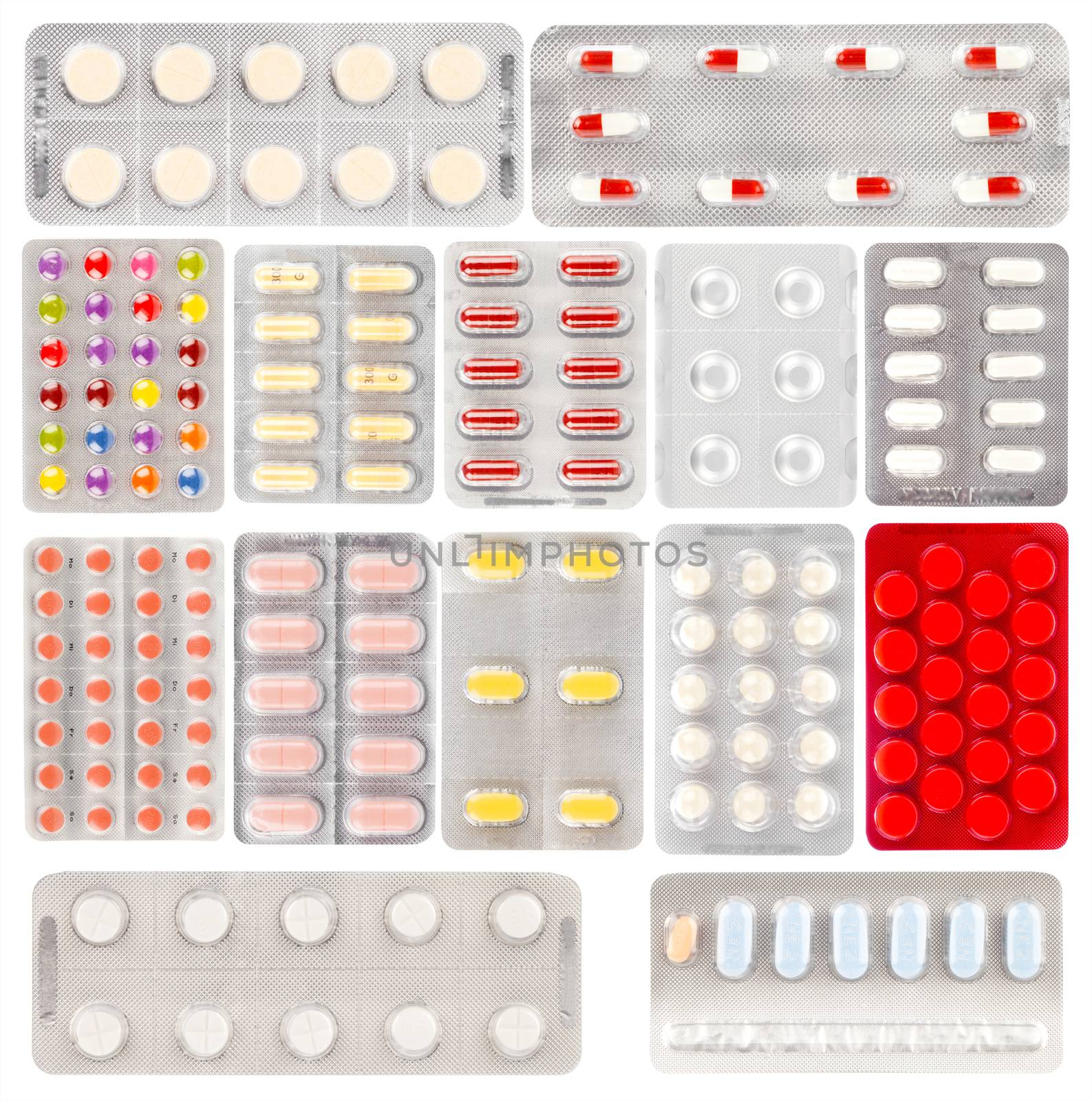 Set of pills in a plastic blister package, on white background by motorolka