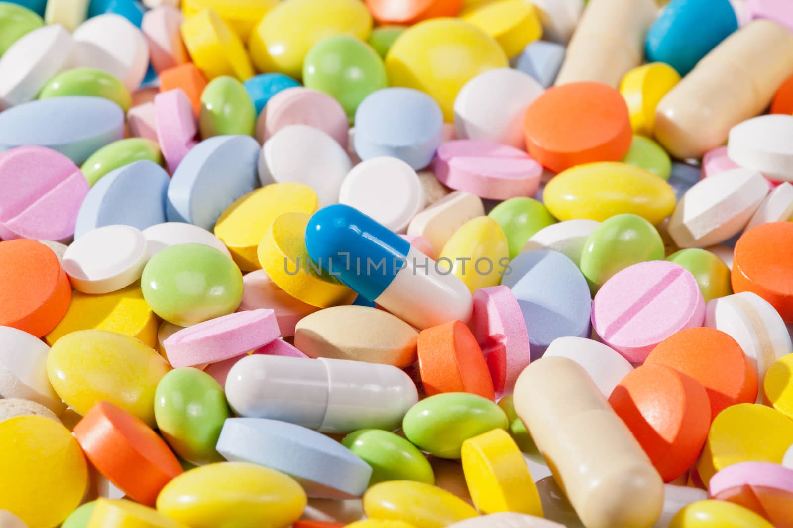 background of colorful pills