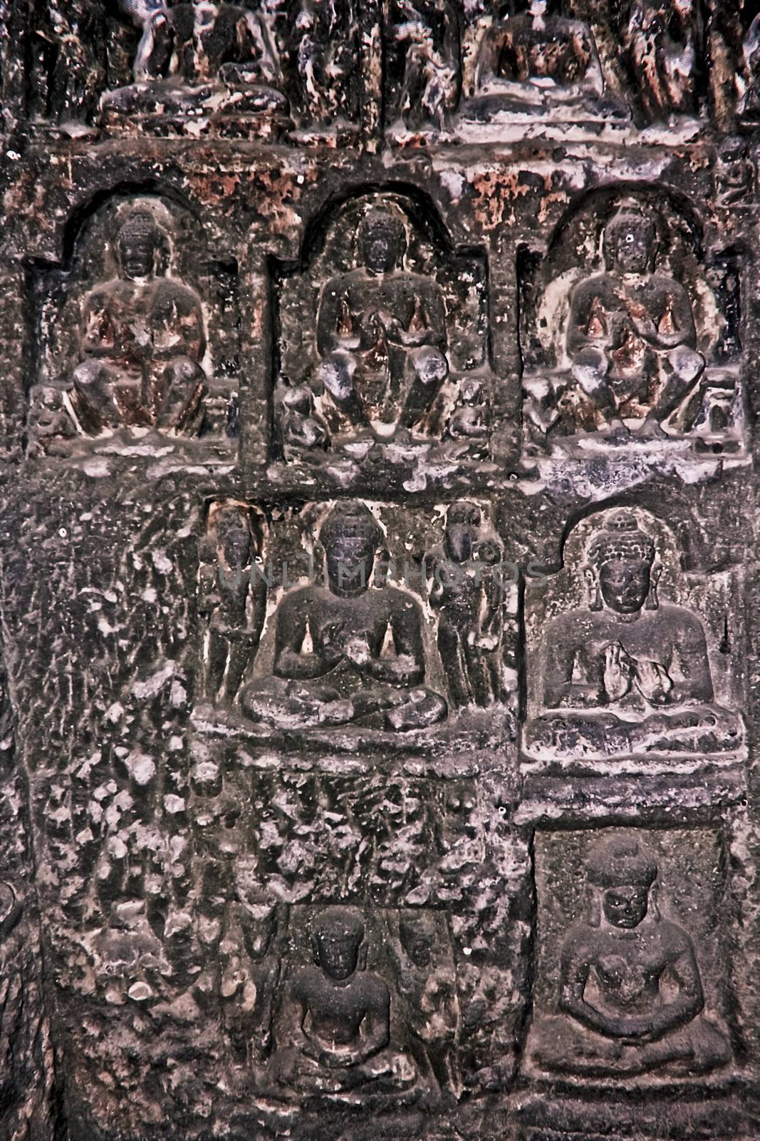 Miracle of Sravasti, Aurangabad Cave No. 2, where the Buddha transforms himself into a thousand Buddhas, Aurangabad, Maharashtra, India. The Aurangabad caves are 12 artificial rock-cut Buddhist shrines located on a hill running roughly east to west, nearly 2 km north from Bibi Ka Maqbara in Aurangabad, Maharashtra, India. The Aurangabad Caves were dug out of comparatively soft basalt rock during the 6th and 7th century. Caves are divided into three separate groups depending on their location.