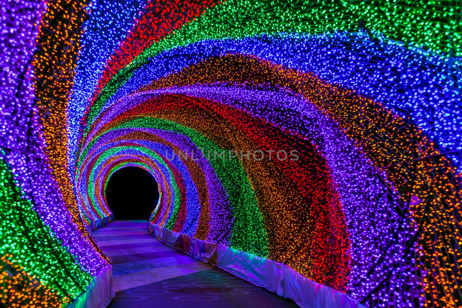 Colorful rainbow tunnel light, abstract background in night