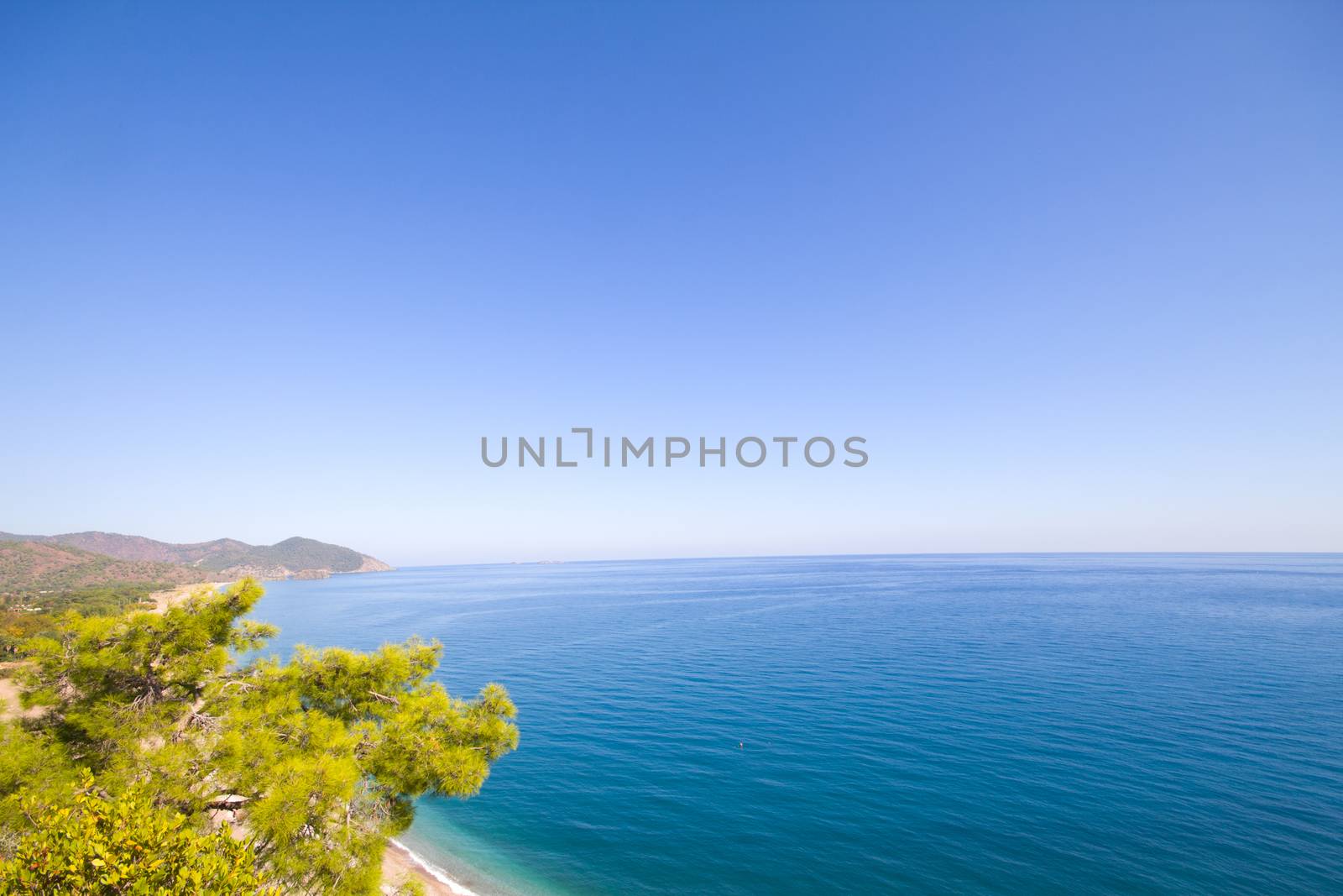 sea a beach and mountains from height