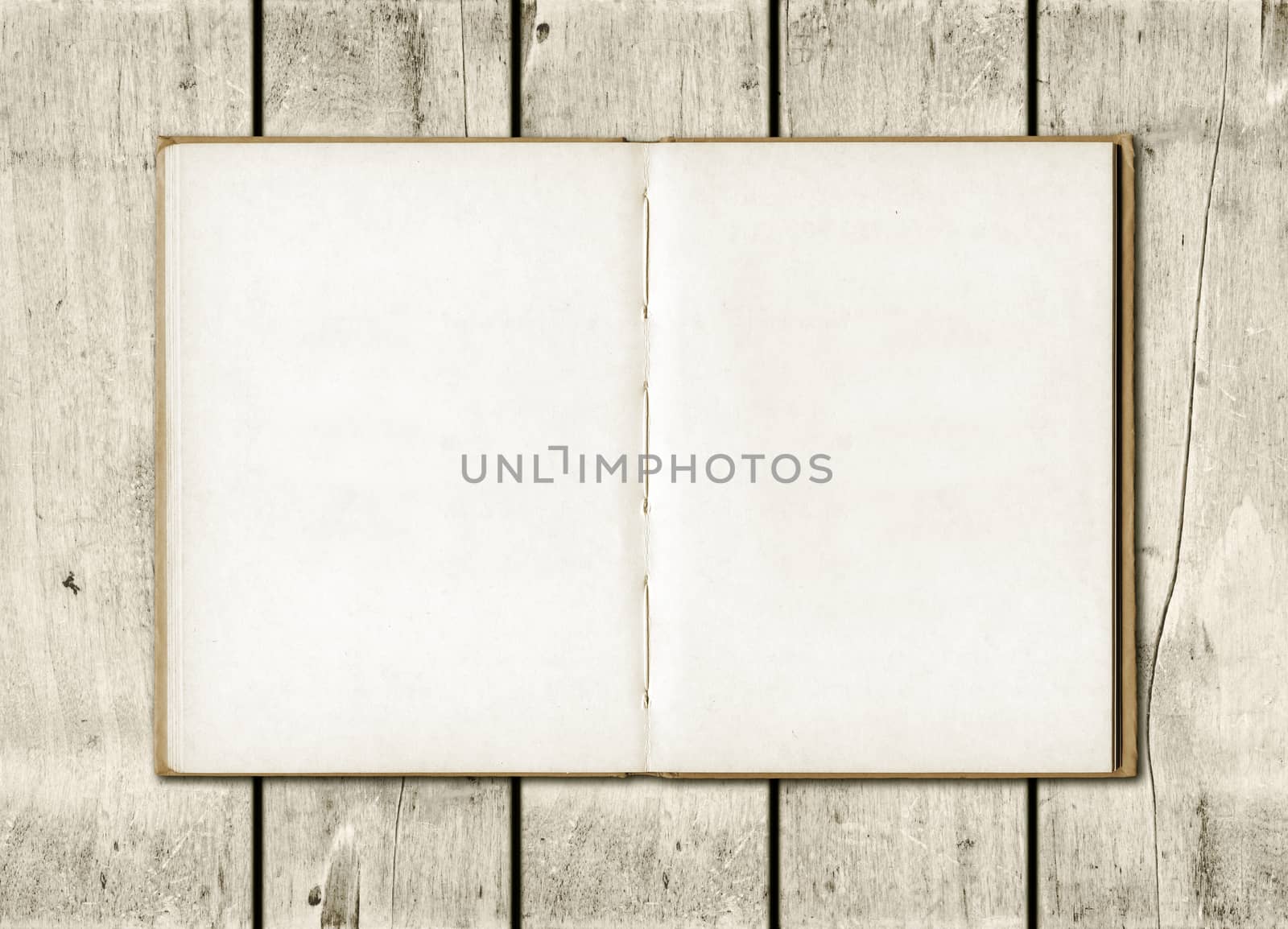 Note book on a white wood background by daboost
