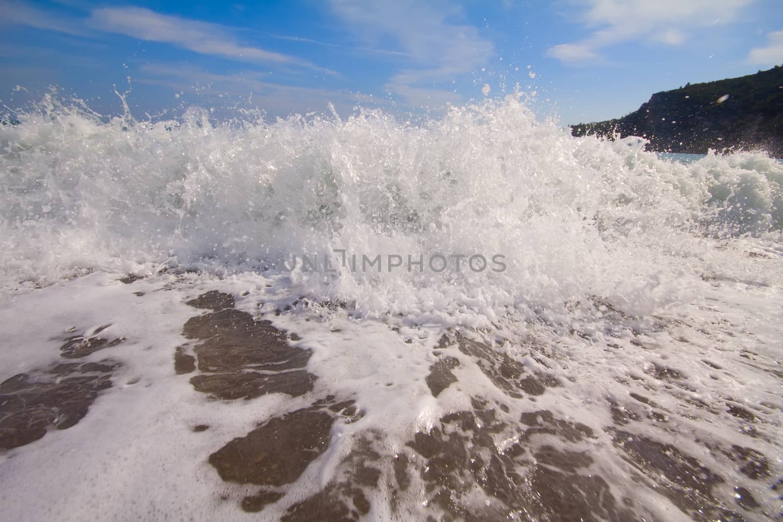 sea wave directly before us