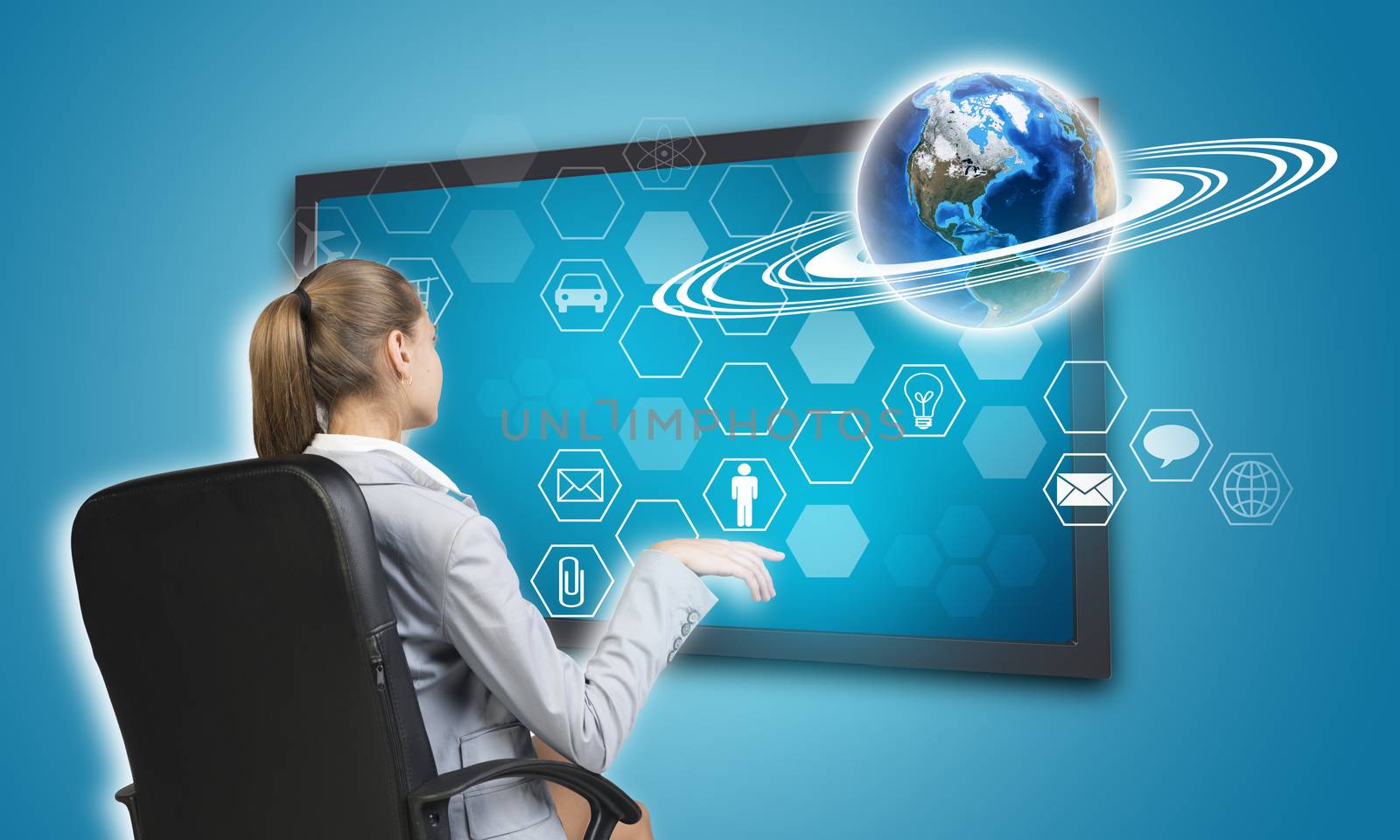 Businesswoman pressing touch screen button on virtual interface with Globe and hexagons with icons, on blue background. Element of this image furnished by NASA