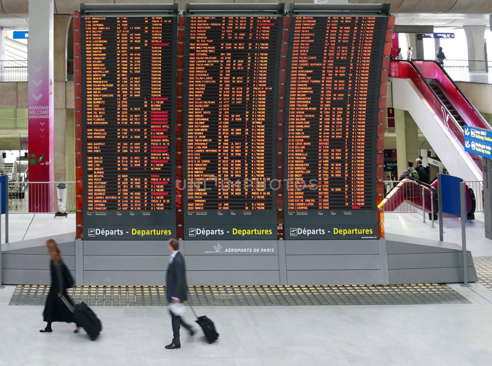 Paris, France - September 16, 2010: Flight announcement shows time of departure on a screen, airport Charles de Gaulle in Paris, France