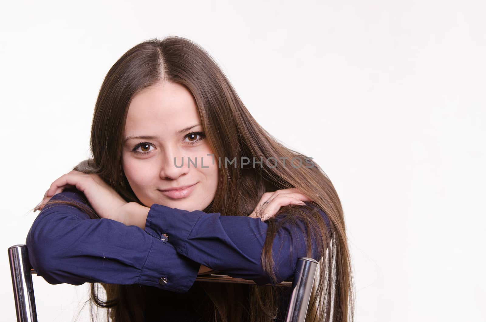 Portrait of a beautiful young woman of the European type on a white background