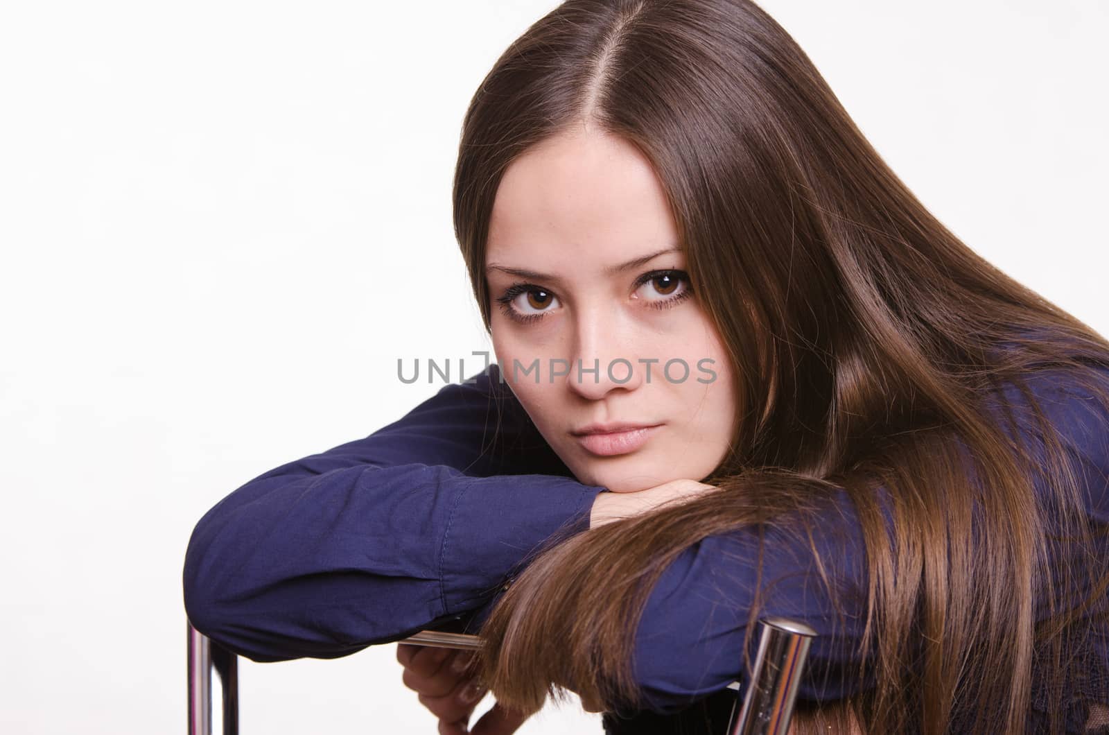 Portrait of a beautiful young woman of the European type on a white background