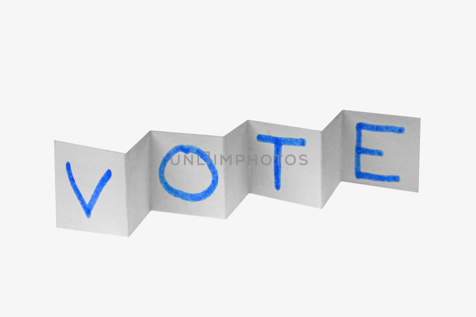 VOTE word written on paper by yands