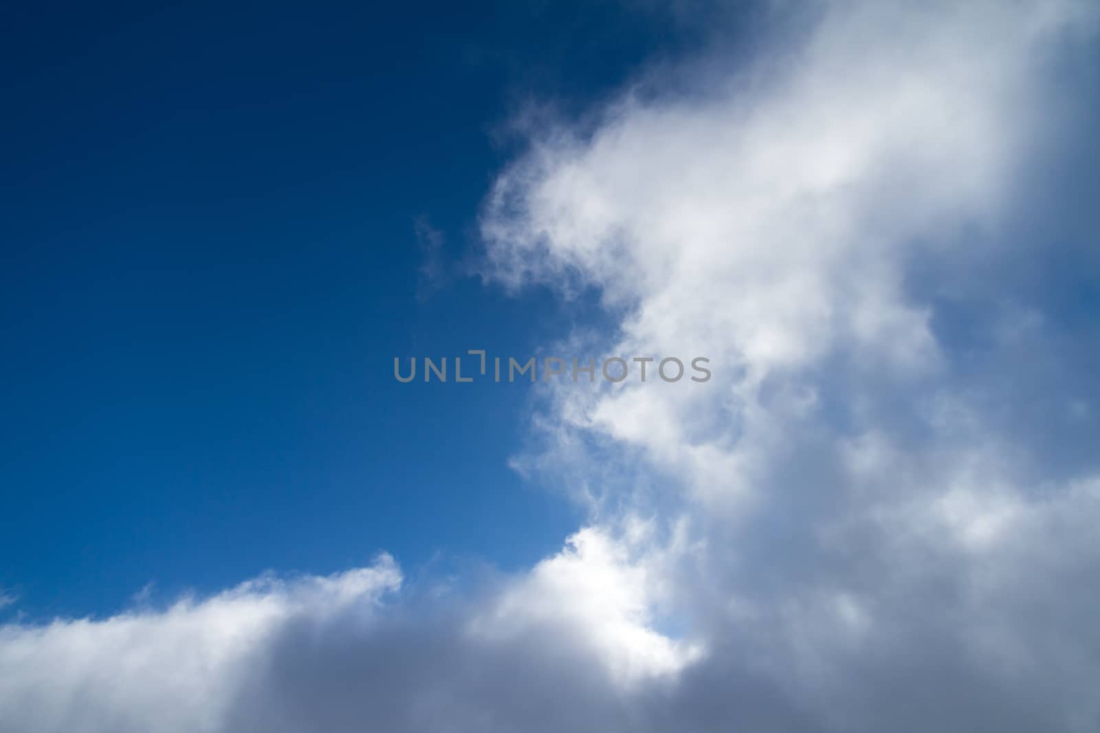 White clouds in blue sky.
