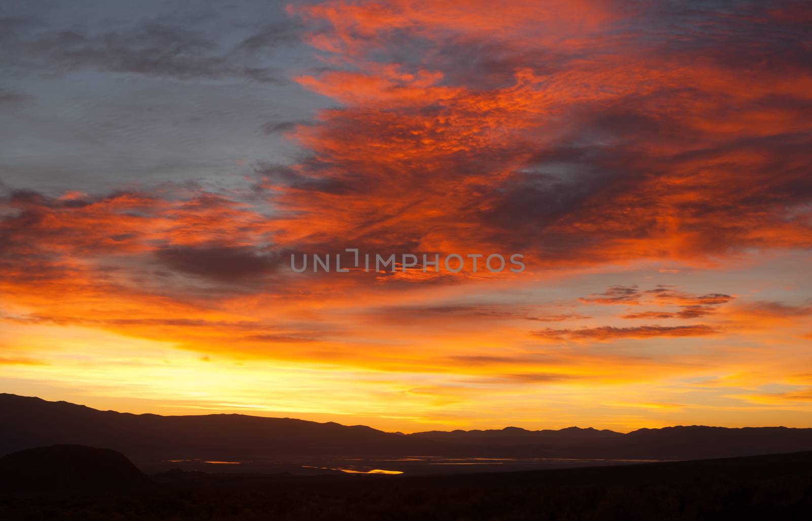 Sunrise Comes over Owens Lake Sierra Nevada Range California by ChrisBoswell