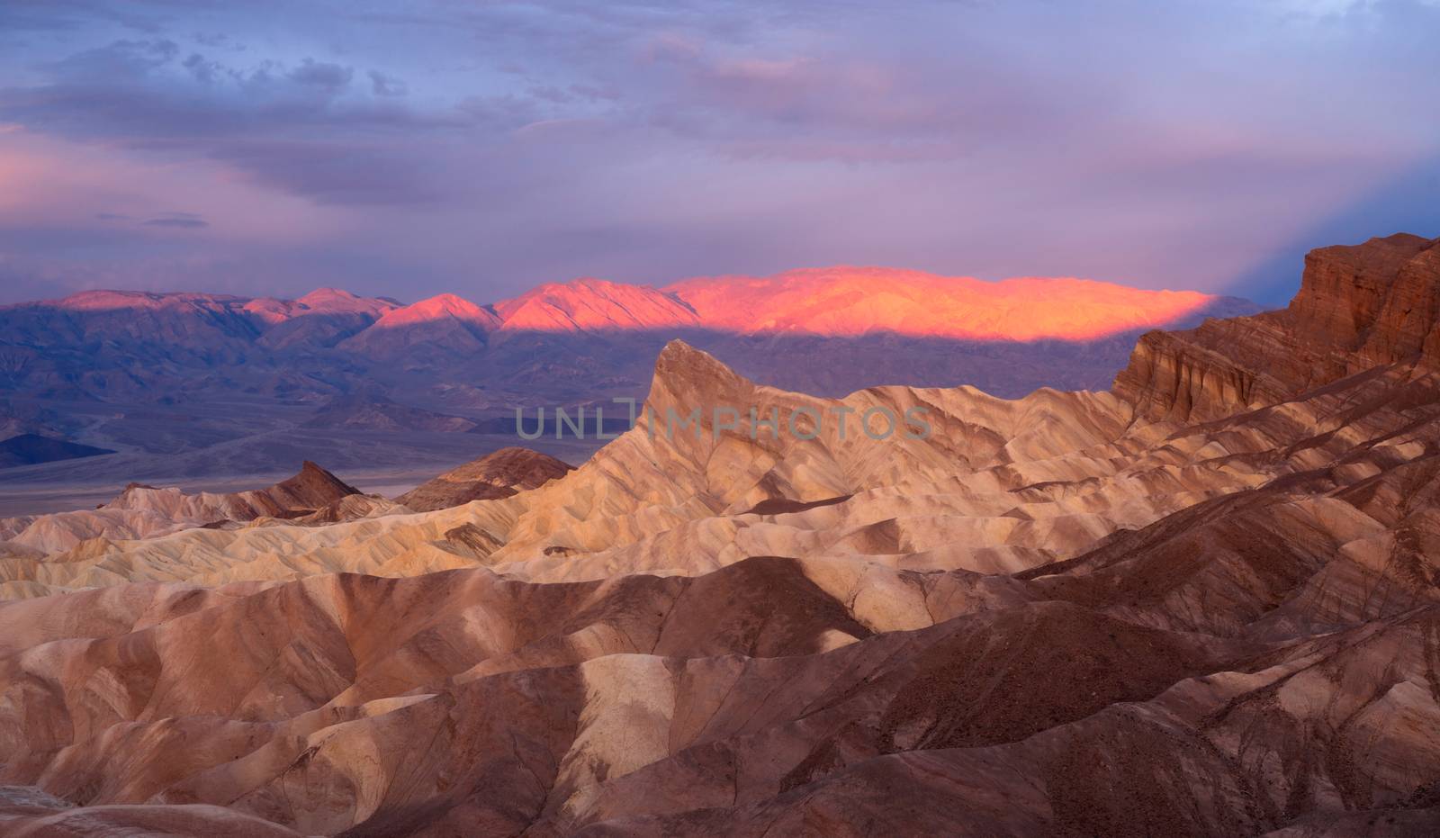 The cloud cover makes it dramatic at sunrise in Death Valley