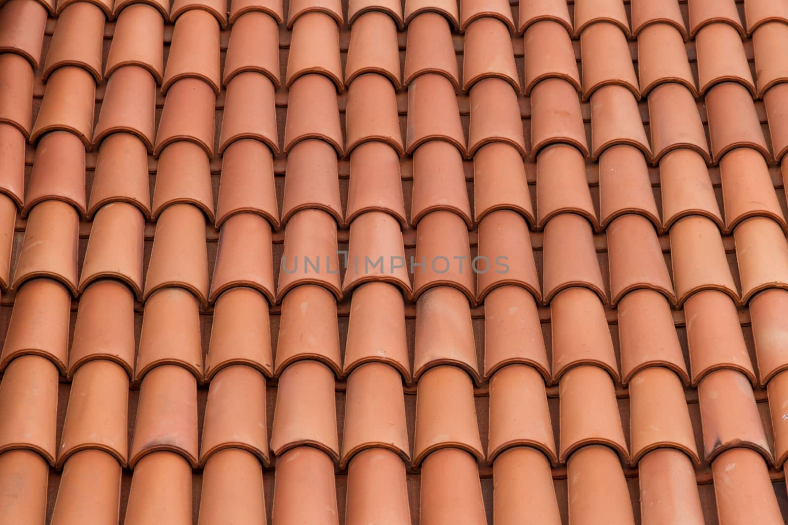 Roof tiles background texture in regular rows.