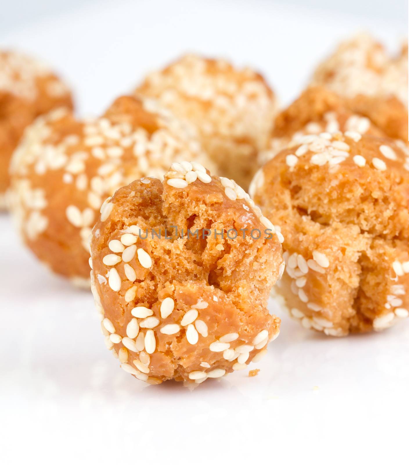 crispy donut ball with white sesame on white background