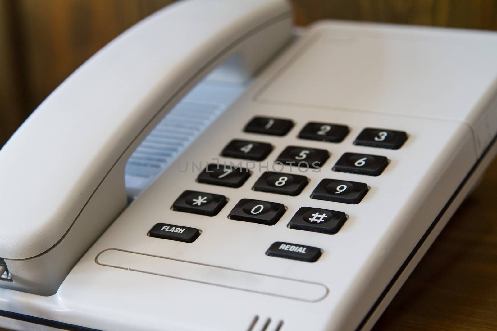 Telephone for customer service in hotel room.