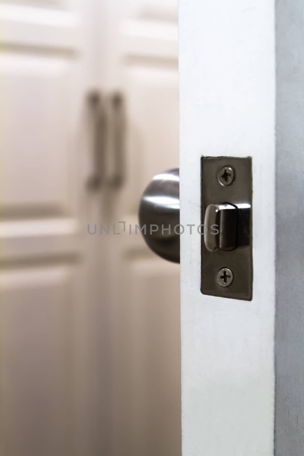 Detail of white opened door.