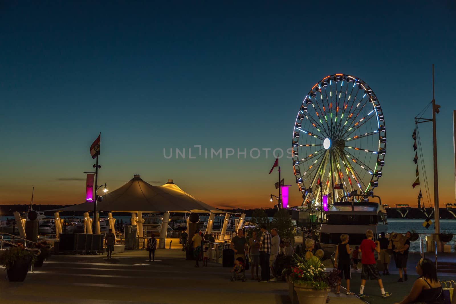 Maryland, Aug 28: People enjoy a beautiful summer evening at the National Harbour in Maryland, USA -  August 28, 2014.