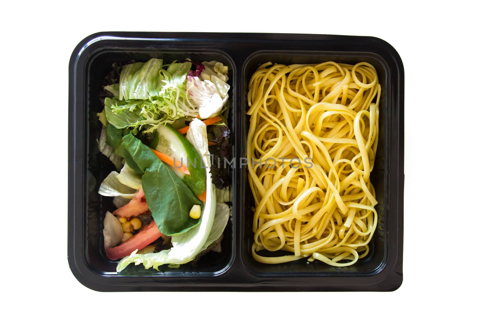 Top view of food, salad and spaghetti.