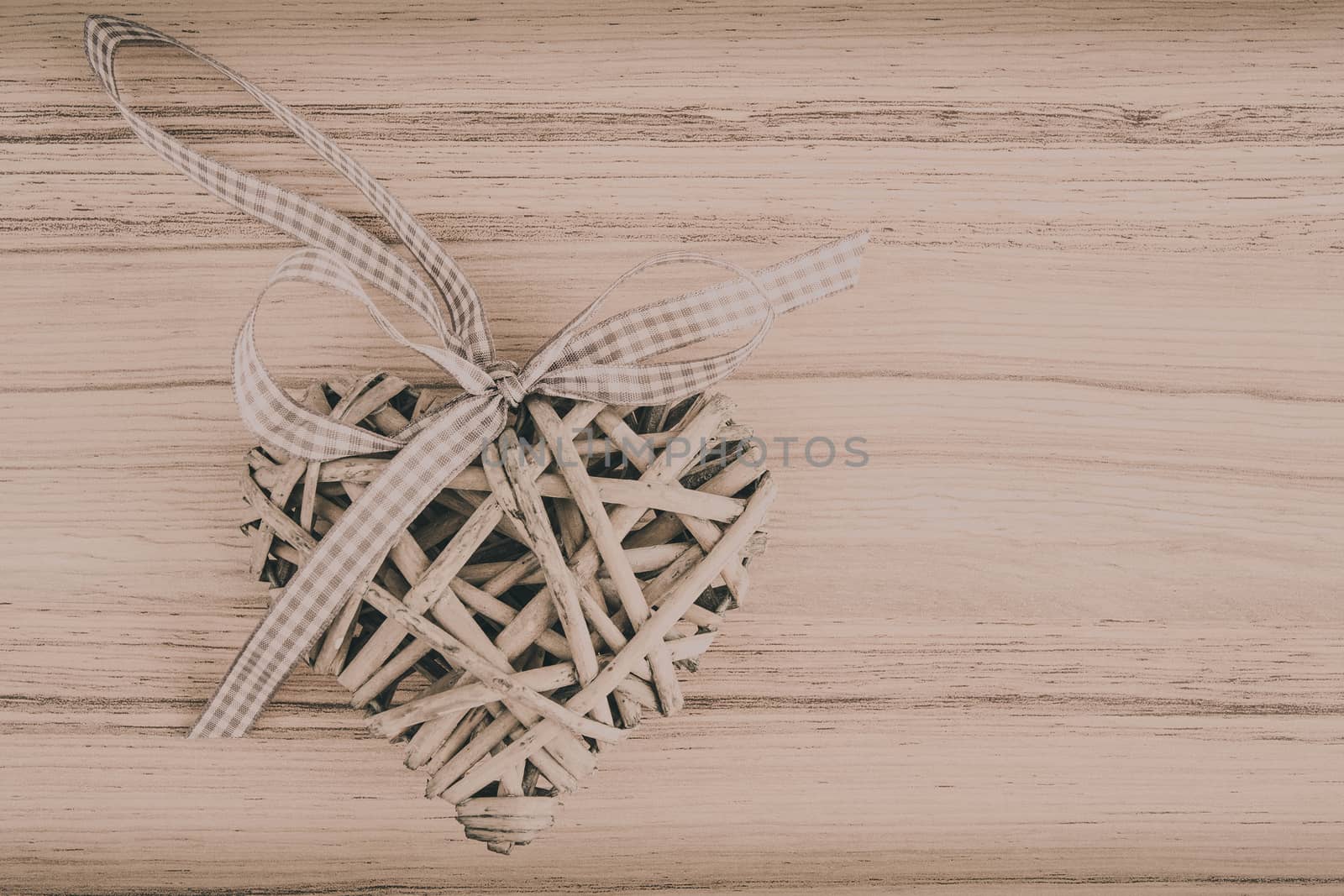 valentine's wooden heart on wooden background , valentine's day , day valentine postcard with space for text
