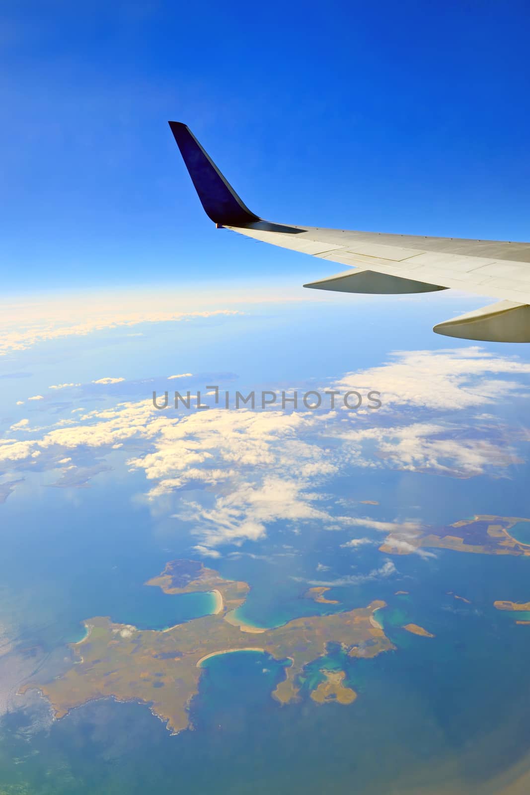 view from the airplane window over the ocean