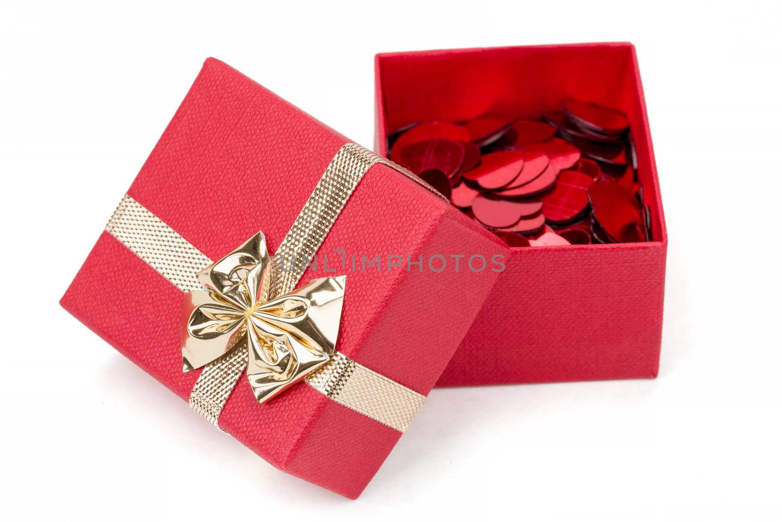 small red hearts confetti and present box isolated on white background