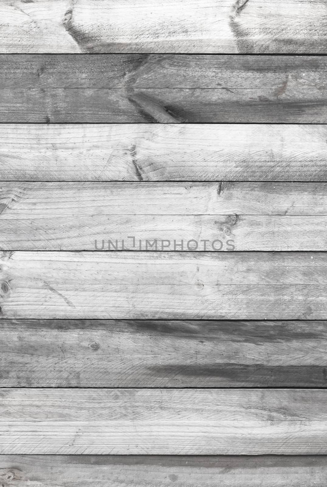 monochrome wood plank wall texture background by nopparats