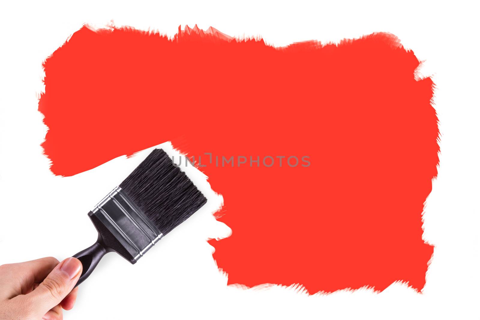 Hand painting white wall with orange color with copy space for your design.