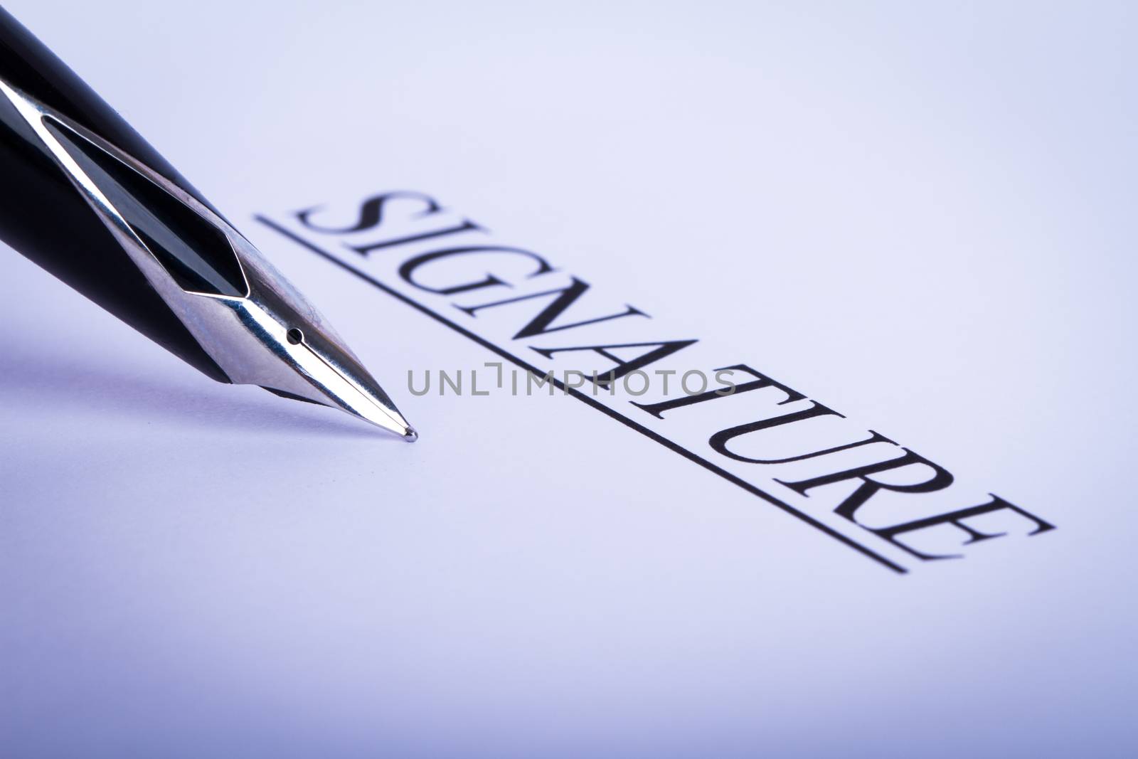 Business concept, close up view of black fountain pen waiting for signing, blank paper with signature text.