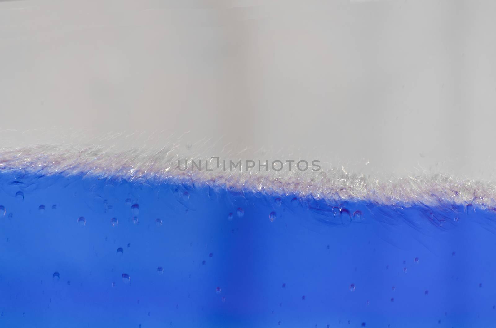 Close up of a blue liquid, water, background image.